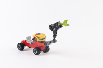 Obraz premium Colorful bricks construction vehicle toy that developes creativity and imagination.