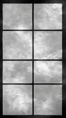 Eight square tiles in a minimalist design with mottled gray texture and dark grout lines studio shot close up