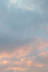 Soft sunset sky with gentle hues and silhouetted architectural detail