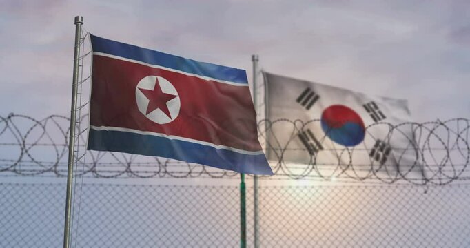 South Korea and North Korea waving flags on country border concept. Both Koreas blowing banner with barbed wire fence.