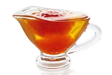 fruit sweet jam in glass sauceboat isolated on white background.