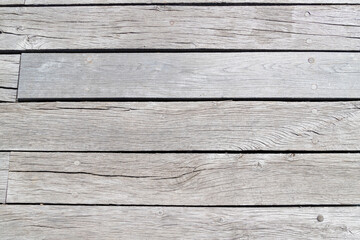 Aged Wooden Planks With Textured Finish In Natural Outdoor Setting
