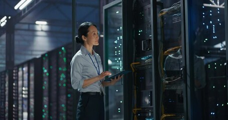 Data Center Female IT Specialist Using Tablet in Server Room. Artificial Intelligence Computing Facility with Asian Maintenance Administrator Working on Computer. Information Technology Professional - Powered by Adobe