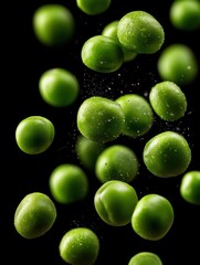 Green peas in motion creating a dynamic visual against a dark background during an artistic food photography session