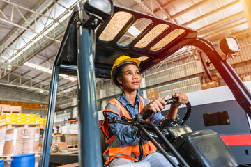 warehouse worker forklift driver happy smiling enjoy staff working. african black women factory cargo shipping worker © Quality Stock Arts