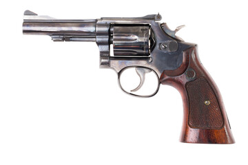 Old western era revolver on white background