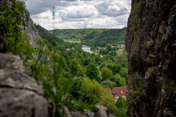 Rock Climbing Crag At Prunner Wall In The Bavarian Jura: Sharp Limestone Pinnacles Rising From Forest Floor Surrounded By Lush Green Trees In A Popular Outdoor Climbing Area In Bavaria, Germany