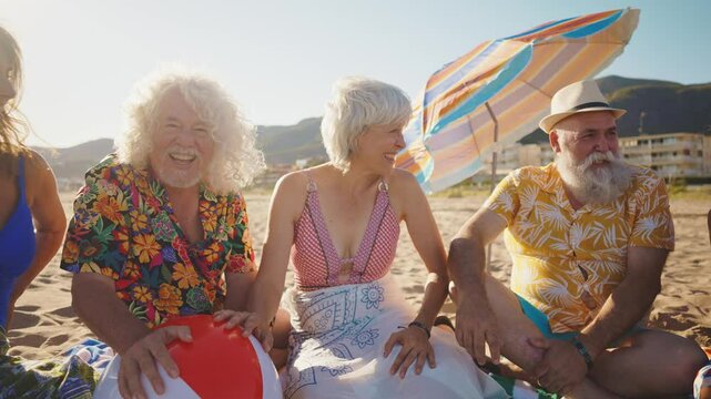 Happy senior people at the beach joyful senior friends are gathering around a charismatic man with long white hair, laughing and embracing on a sunny beach
