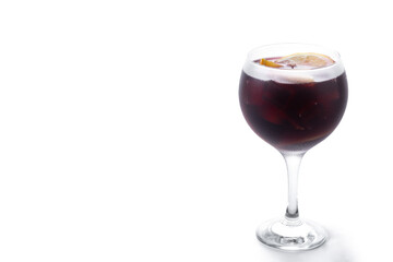 Refreshing Summer Citrus Fruit Sangria in crystal glass isolated on white background. Copy space