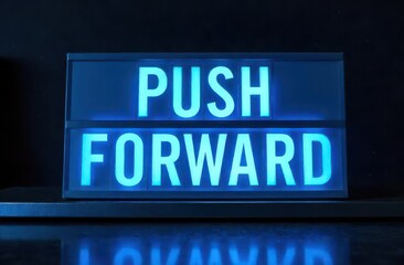 Fototapeta premium glowing blue neon sign displaying push forward against dark background. motivational message concept. encouragement, inspiration, office decor.