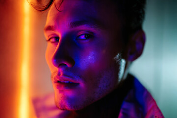 Generative AI image of person relaxing in water under neon lights during night pool party vacation with friends chilling and enjoying summer vibes