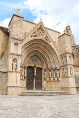 Obraz premium Architectural details of The Apostles door of Santa Maria La Mayor church in Morella town, Castellon