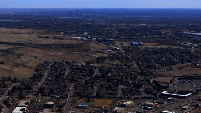 Lookout Mountain Golden Downtown Denver cityscape from North Table Mesa aerial drone Colorado daytime winter sunny clouds neighborhood Front Range Rocky Mountains Arvada Lakewood forward pan up motion
