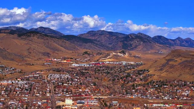 Golden Colorado aerial drone Historic downtown Golden Gate Canyon winter sunny morning afternoon blue sky Highway 93 Boulder Flat Irons Clear Creek Canyon Lookout Mountain buildings upwards motion