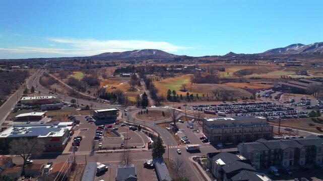 Snowy Lookout Mountain Morrison Golden High School Colorado aerial drone Colorado Fossil Trace Golf Club Jefferson County historic downtown winter sunny morning afternoon blue sky homes upwards motion