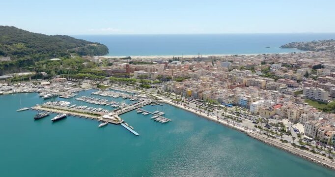 Aerial view of the Gaeta port, overlooking the Mediterranean Sea. It is located in the province of Latina, Lazio, Italy. In background is the Serapo beach.