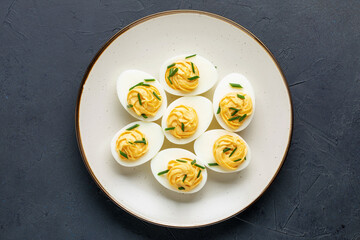 Egg flight  -Stuffed eggs with  yolk, mayonnaise an scallion. Top view