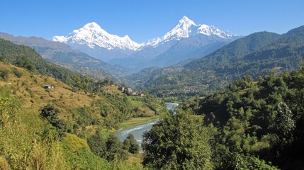Majestic Annapurna Range Overlooking a Serene River Valley in Nepal