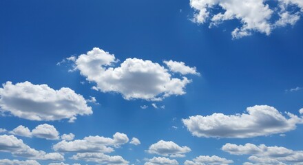 Obraz premium Fluffy clouds in a vast blue sky