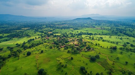 Fototapeta premium Aerial View of Lush Green Landscape in Rural Africa