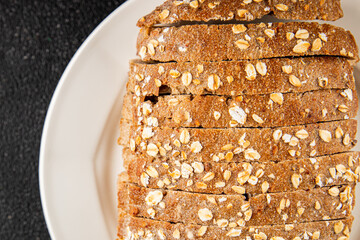 Oat bread oatmeal wholegrain pastry natural food fresh gourmet food background on the table rustic food top view copy space