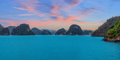 Halong Ha Long Bay Hanoi this Vietnamese wonder is littered with mountains and Rock cliffs popping...
