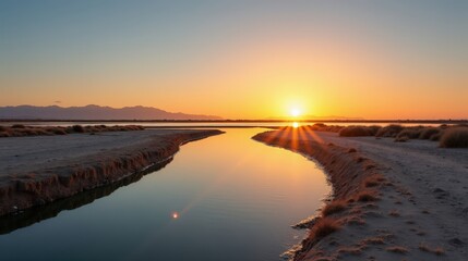 Panoramic photo of San Pedro Salt Marshes, Spain, at dawn, with clear sunny skies.