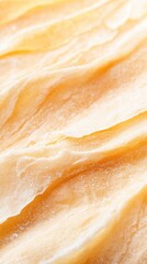 Obraz premium Extreme macro shot of butter croissant showing delicate flaky layers, golden crust and airy interior, with crumbs scattered and warm soft lighting highlighting artisanal texture..