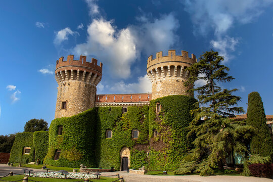 The imposing Gothic castle of Peralada, surrounded by gardens, stands out among the main attractions of this medieval town. Peralada, Spain