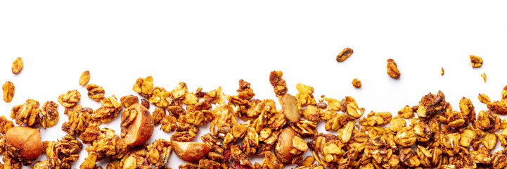 Granola panorama on a white background, with copy space. Organic gourmet muesli, shot from the top