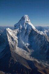 Ama Dablam Mountain looms majestically in Nepal Himalayas aerial view of snow capped peak rugged terrain remote landscape clear blue sky adventure travel