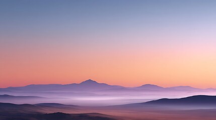 Obraz premium Vast Mountain Range Stretching Across Horizon During Sunset with Soft Pastel Colors and Misty Landscape