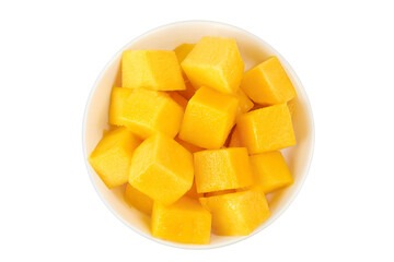 mango diced in ceramic bowl isolated on white background. Top view. Flat lay