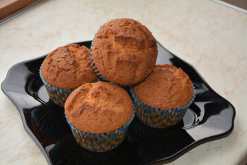 Closeup of a plate with freshly made home cooked cupcakes