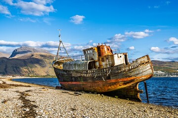 View of Corpach Wreck or Old Boat of Caol and Nevis Range Mountains, Caol Beach, Corpach, Fort...