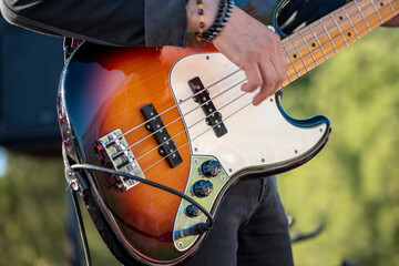 guitarist playing electric guitar at a rock concert