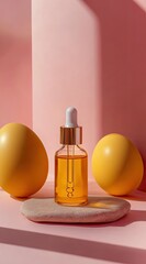 Amber serum bottle with dropper, on light stone, flanked by two yellow eggs, against a pink backdrop, sunlit