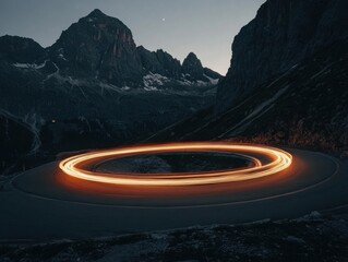 Long Exposure of Car Lights on Mountain Road at Night; Scenic View; Dramatic Landscape; Transportation; Travel Destination; Adventure; Serpentine Route; Curve; Dusk