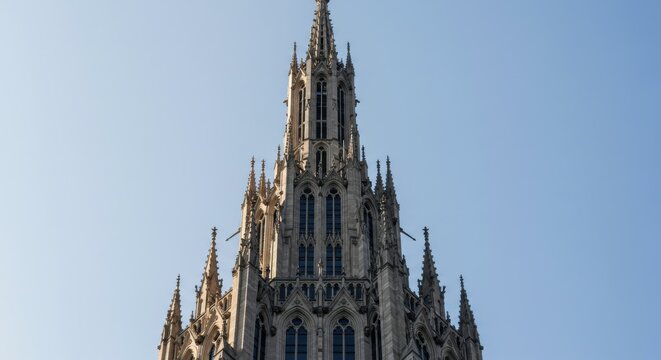 Majestic Gothic Spire Architectural Detail Church Tower Stonework Steeple High Angle View Clear Sky