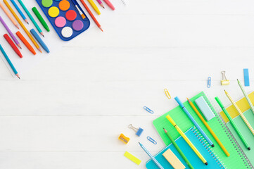 Back to school concept, school supplies and accessories on white background, water color, pencils,...