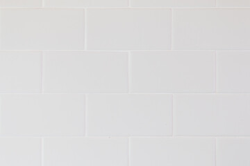 White concrete tile wall modern for Home Ideas Business And for decorating the bathroom. White rectangle mosaic tiles texture background.