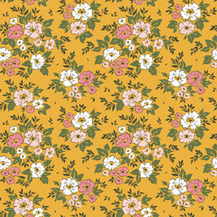 Vintage spring floral pattern in small abstract poses flowers. Small white and pink flowers. Yellow mustard background. Ditsy print. Floral seamless background. Cute template for fashion prints. 
