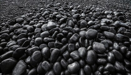 close up texture of black rocks and gravel tightly packed