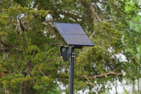 Flock safety police law enforcement license plate reader setup outside to help catch vehicle speeders.