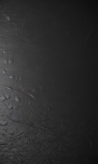 Sleek black leather, smooth surface, subtle texture,  high-resolution,  background