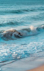 Fototapeta premium Ocean waves crashing on sandy beach summer vacation