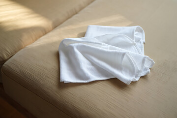 White Cotton Towel on Beige Sofa