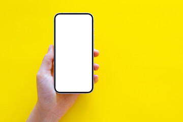 Empty mobile phone's screen, mockup on yellow background