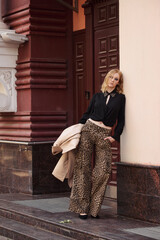 street style fashion girl model in a stylish look on the street.