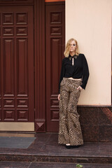 street style fashion girl model in a stylish look on the street.